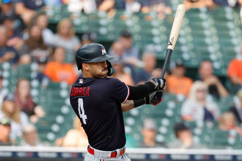 Aug 8, 2023; Detroit, Michigan, USA;  Minnesota Twins shortstop Carlos Correa (4) hits a single in the first inning against the Detroit Tigres at Comerica Park. Mandatory Credit: Rick Osentoski-USA TODAY Sports