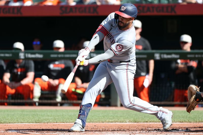 May 17, 2025; Baltimore, Maryland, USA; Washington Nationals second baseman Luis Garcia Jr. (2) hits a single during the first inning against the Baltimore Orioles at Oriole Park at Camden Yards. Mandatory Credit: Daniel Kucin Jr.-Imagn Images