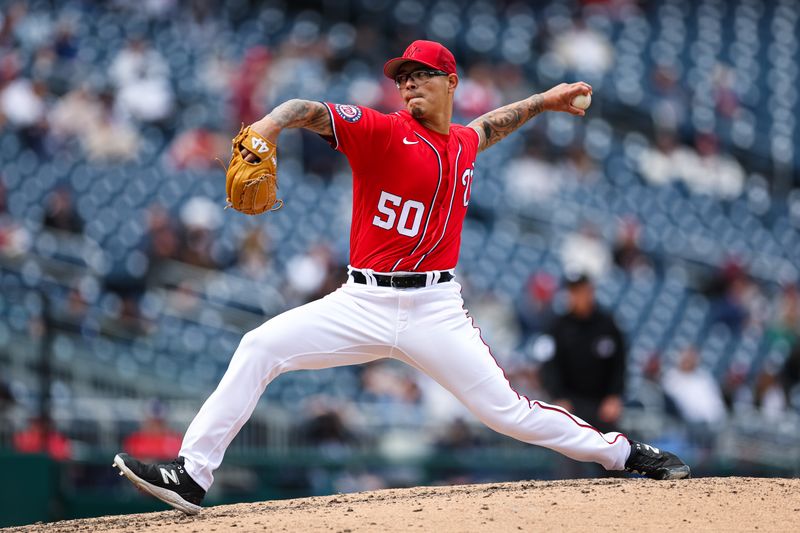 Mar 28, 2023; Washington, District of Columbia, USA; Washington Nationals relief pitcher Anthony Banda (50) delivers a pitch against the New York Yankees during the eighth inning of the Spring Training game at Nationals Park. Mandatory Credit: Scott Taetsch-USA TODAY Sports