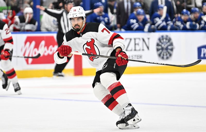 Apr 11, 2024; Toronto, Ontario, CAN; New Jersey Devils defenseman Jonas Siegenthaler (71) pursues the play against the Toronto Maple Leafs in the first period at Scotiabank Arena. Mandatory Credit: Dan Hamilton-USA TODAY Sports