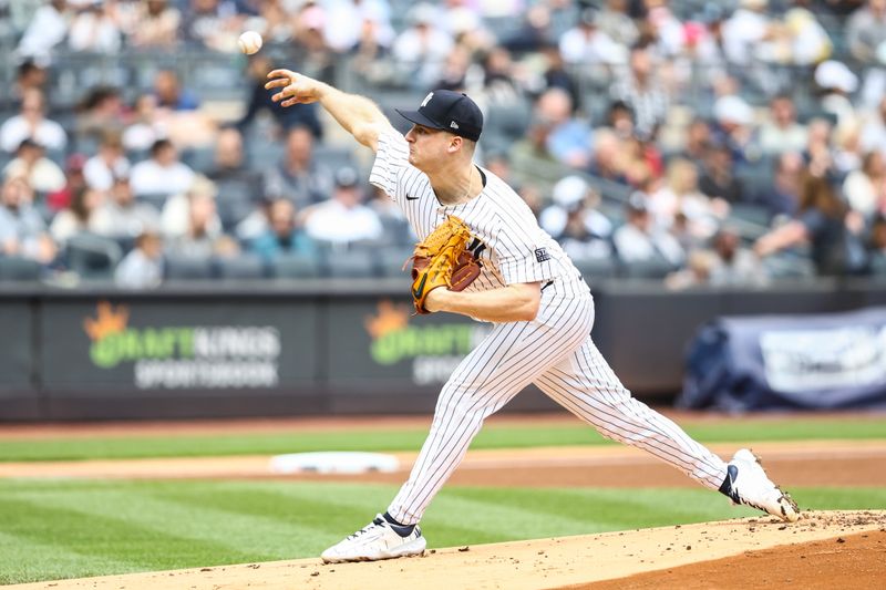 May 4, 2024; Bronx, New York, USA;  New York Yankees starting pitcher Clarke Schmidt (36) pitches in the first inning against the Detroit Tigers at Yankee Stadium. Mandatory Credit: Wendell Cruz-USA TODAY Sports