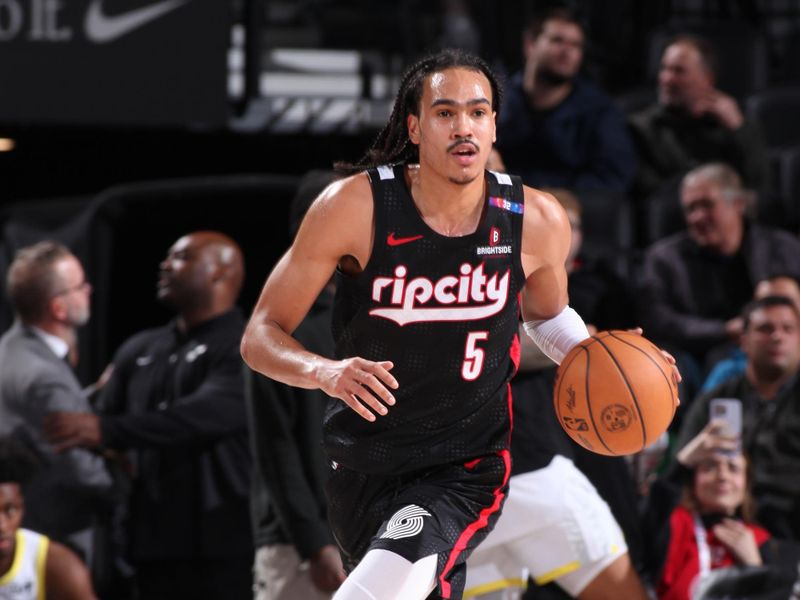 PORTLAND, OR - DECEMBER 6: Dalano Banton #5 of the Portland Trail Blazers dribbles the ball during the game against the Utah Jazz on December 6, 2024 at the Moda Center Arena in Portland, Oregon. NOTE TO USER: User expressly acknowledges and agrees that, by downloading and or using this photograph, user is consenting to the terms and conditions of the Getty Images License Agreement. Mandatory Copyright Notice: Copyright 2024 NBAE (Photo by Cameron Browne/NBAE via Getty Images)