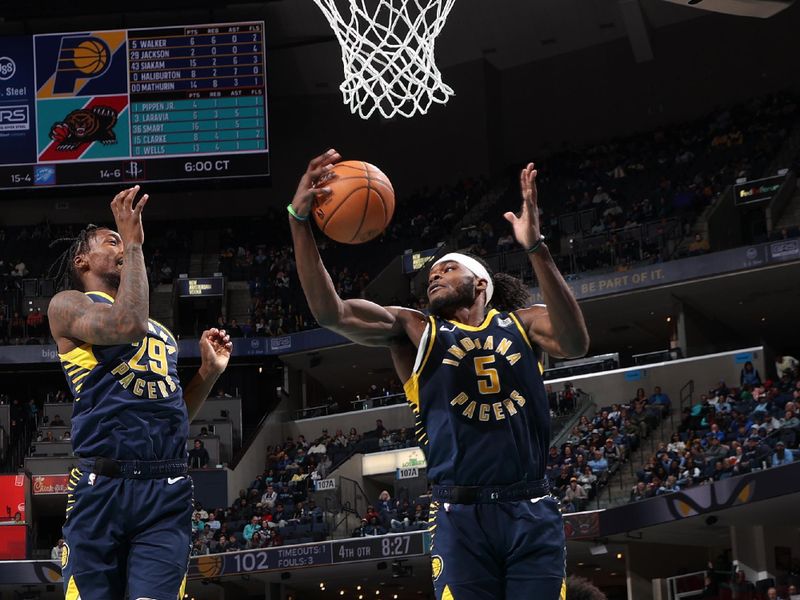 MEMPHIS, TN - DECEMBER 1: Jarace Walker #5 of the Indiana Pacers rebounds during the game against the Memphis Grizzlies on December 1, 2024 at FedExForum in Memphis, Tennessee. NOTE TO USER: User expressly acknowledges and agrees that, by downloading and or using this photograph, User is consenting to the terms and conditions of the Getty Images License Agreement. Mandatory Copyright Notice: Copyright 2024 NBAE (Photo by Joe Murphy/NBAE via Getty Images)