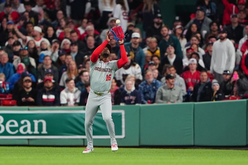 May 10, 2024; Boston, Massachusetts, USA; Washington Nationals right fielder Victor Robles (16) catches a fly ball hit by Boston Red Sox first baseman Garrett Cooper (not pictured) during the sixth inning at Fenway Park. Mandatory Credit: Gregory Fisher-USA TODAY Sports