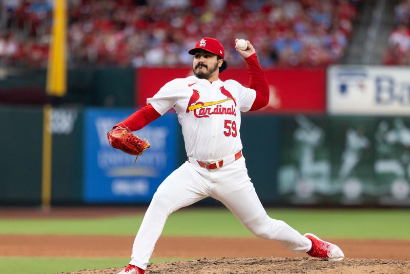 Jun 26, 2024; St. Louis, Missouri, USA; St. Louis Cardinals pitcher JoJo Romero (59) enters the game against the Atlanta Braves in the eighth inning at Busch Stadium. Mandatory Credit: Zach Dalin-USA TODAY Sports