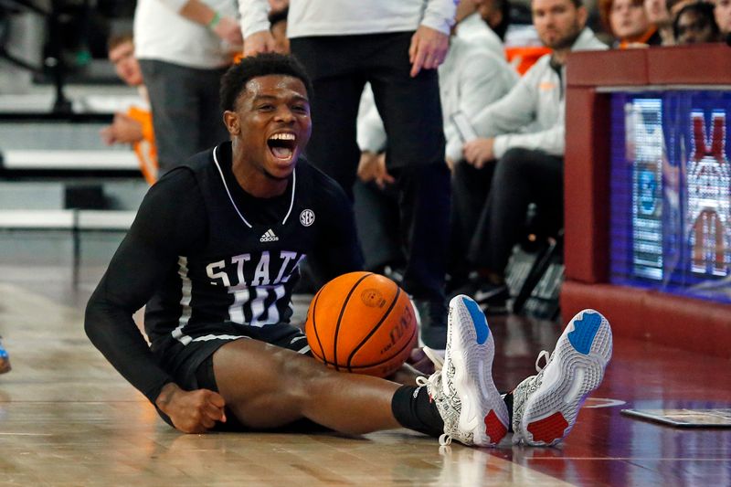 Jan 17, 2023; Starkville, Mississippi, USA; Mississippi State Bulldogs guard Dashawn Davis (10) reacts after a turnover during the first half against the Tennessee Volunteers at Humphrey Coliseum. Mandatory Credit: Petre Thomas-USA TODAY Sports