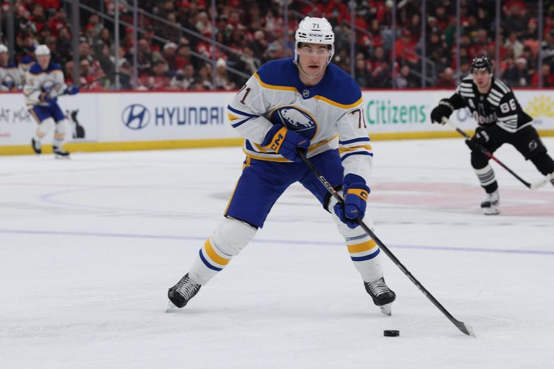 Dec 21, 2025; Newark, New Jersey, USA;  Buffalo Sabres center Ryan McLeod (71) controls the puck against the New Jersey Devils  during the first period at Prudential Center. Mandatory Credit: Thomas Salus-Imagn Images