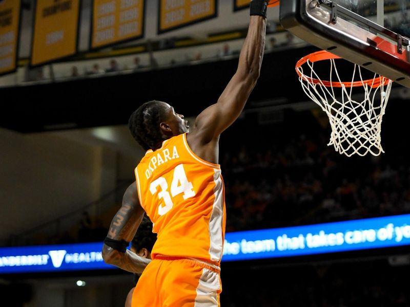 Jan 18, 2025; Nashville, Tennessee, USA;  Tennessee Volunteers forward Felix Okpara (34) dunks the ball against the Vanderbilt Commodores during the second half at Memorial Gymnasium. Mandatory Credit: Steve Roberts-Imagn Images