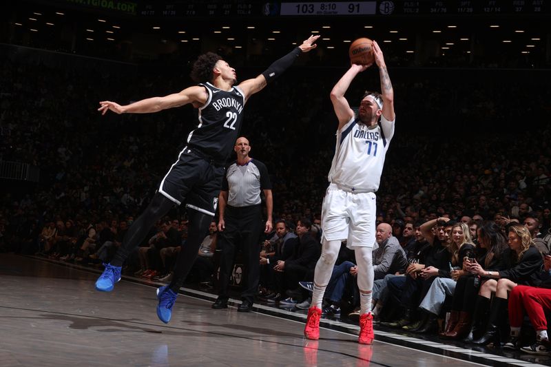 BROOKLYN, NY - FEBRUARY 6: Jalen Wilson #22 of the Brooklyn Nets plays defense during the game  against Luka Doncic #77 of the Dallas Mavericks on February 6, 2024 at Barclays Center in Brooklyn, New York. NOTE TO USER: User expressly acknowledges and agrees that, by downloading and or using this Photograph, user is consenting to the terms and conditions of the Getty Images License Agreement. Mandatory Copyright Notice: Copyright 2024 NBAE (Photo by Nathaniel S. Butler/NBAE via Getty Images)