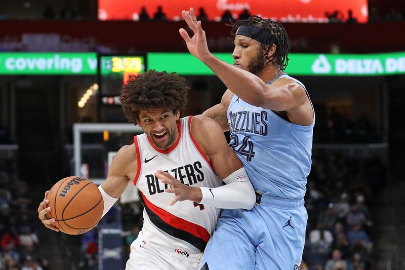 MEMPHIS, TENNESSEE - MARCH 02: Matisse Thybulle #4 of the Portland Trail Blazers drives to the basket against Lamar Stevens #24 of the Memphis Grizzlies during the second half at FedExForum on March 02, 2024 in Memphis, Tennessee. NOTE TO USER: User expressly acknowledges and agrees that, by downloading and or using this photograph, User is consenting to the terms and conditions of the Getty Images License Agreement. (Photo by Justin Ford/Getty Images)