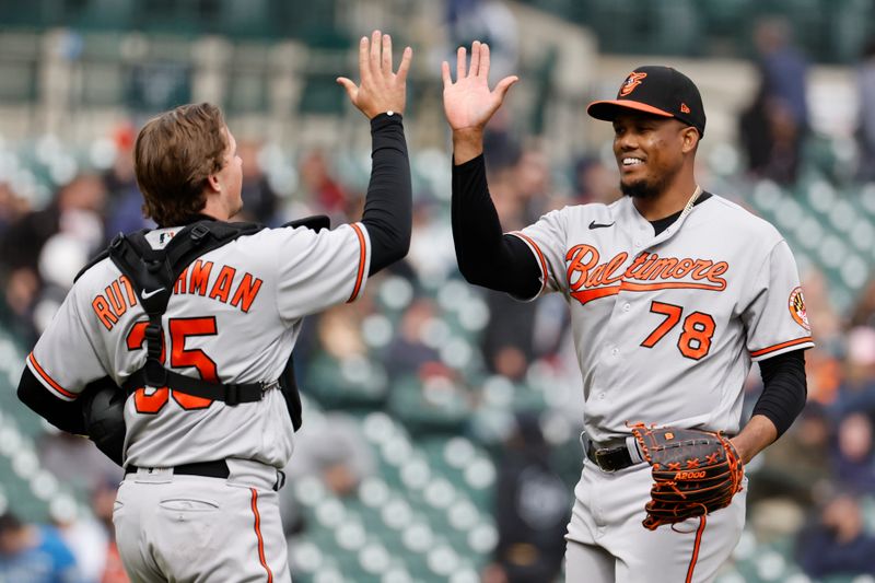 Apr 30, 2023; Detroit, Michigan, USA; Baltimore Orioles catcher Adley Rutschman (35) and relief pitcher Yennier Cano (78) celebrate after defeating the Detroit Tigers at Comerica Park. Mandatory Credit: Rick Osentoski-USA TODAY Sports