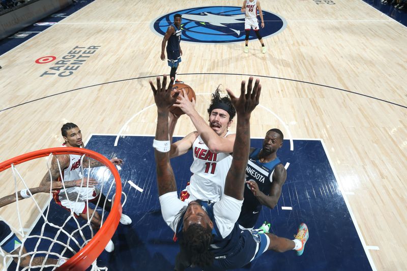 MINNEAPOLIS, MN -  NOVEMBER 10: Jaime Jaquez Jr. #11 of the Miami Heat drives to the basket during the game against the Miami Heat on November 10, 2024 at Target Center in Minneapolis, Minnesota. NOTE TO USER: User expressly acknowledges and agrees that, by downloading and or using this Photograph, user is consenting to the terms and conditions of the Getty Images License Agreement. Mandatory Copyright Notice: Copyright 2024 NBAE (Photo by David Sherman/NBAE via Getty Images)