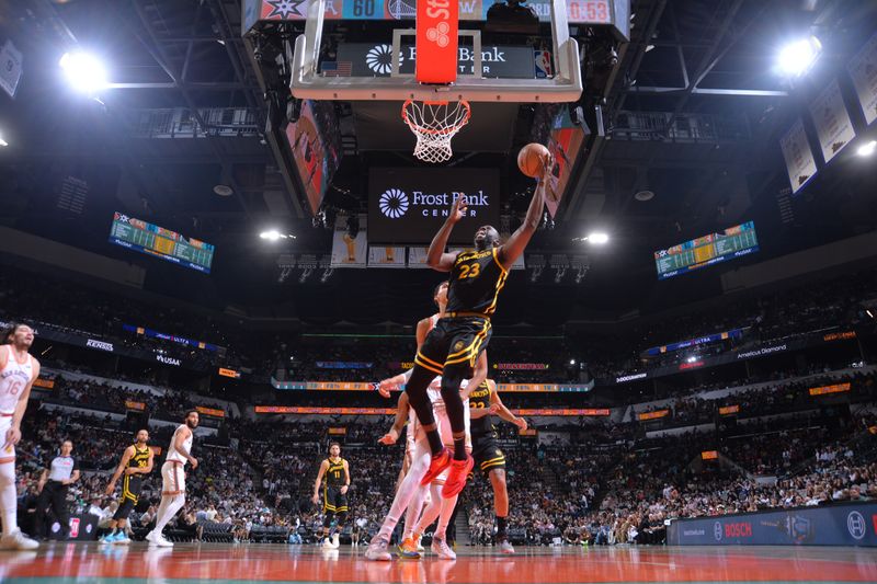 SAN ANTONIO, TX - MARCH 31: Draymond Green #23 of the Golden State Warriors drives to the basket during the game against the San Antonio Spurs on March 31, 2024 at the Frost Bank Center in San Antonio, Texas. NOTE TO USER: User expressly acknowledges and agrees that, by downloading and or using this photograph, user is consenting to the terms and conditions of the Getty Images License Agreement. Mandatory Copyright Notice: Copyright 2024 NBAE (Photos by Michael Gonzales/NBAE via Getty Images)