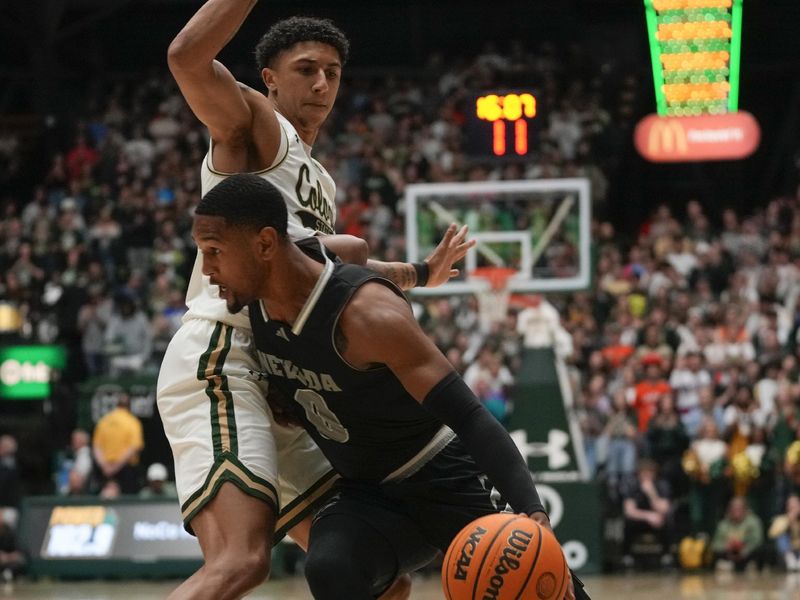 Feb 27, 2024; Fort Collins, Colorado, USA; Nevada Wolf Pack guard Hunter McIntosh (0) drives around Colorado State Rams guard Nique Clifford (10) during the first half at Moby Arena. Mandatory Credit: Michael Madrid-USA TODAY Sports