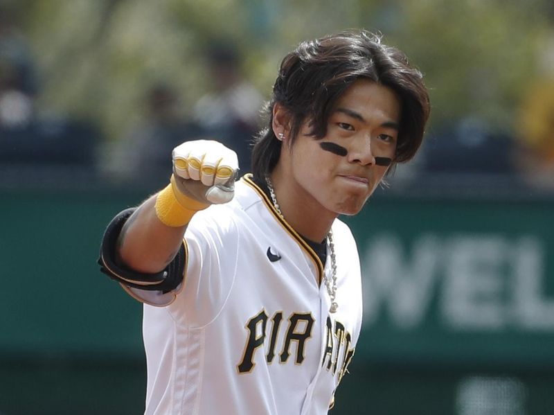 Aug 27, 2023; Pittsburgh, Pennsylvania, USA;  Pittsburgh Pirates second baseman Ji Hwan Bae (3) reacts at second base with a double against the Chicago Cubs during the first inning at PNC Park. Mandatory Credit: Charles LeClaire-USA TODAY Sports