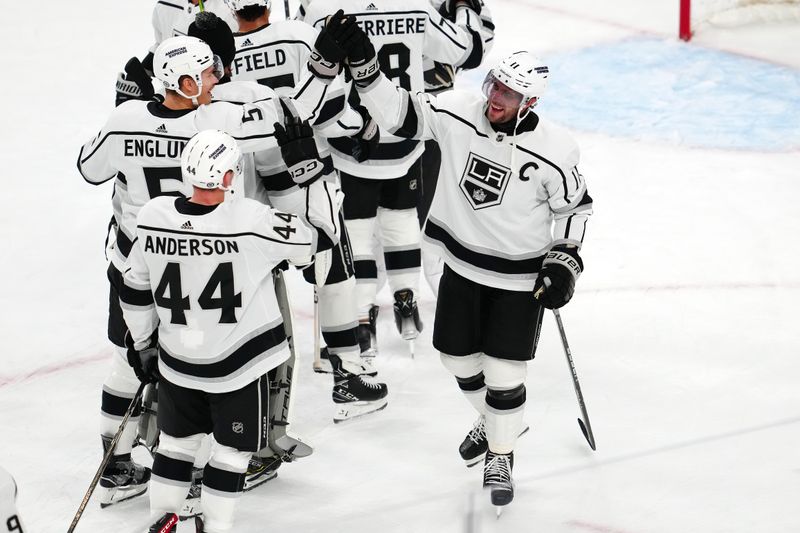 Nov 8, 2023; Las Vegas, Nevada, USA; Los Angeles Kings center Anze Kopitar (11) celebrates with  Los Angeles Kings defenseman Andreas Englund (5) after the Kings defeated the Vegas Golden Knights 4-1 at T-Mobile Arena. Mandatory Credit: Stephen R. Sylvanie-USA TODAY Sports