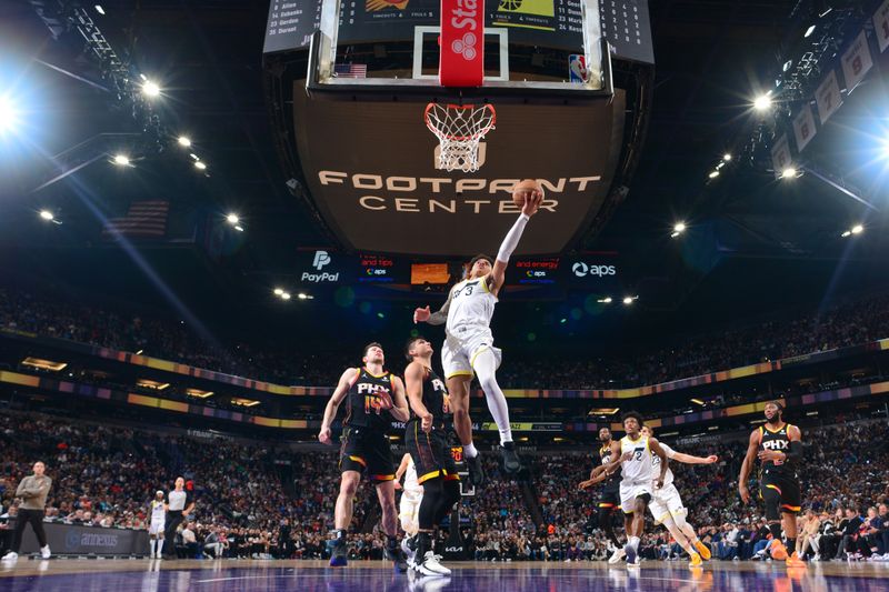 PHOENIX, AZ - FEBRUARY 8:  Keyonte George #3 of the Utah Jazz goes to the basket during the game on February 8, 2024 at Footprint Center in Phoenix, Arizona. NOTE TO USER: User expressly acknowledges and agrees that, by downloading and or using this photograph, user is consenting to the terms and conditions of the Getty Images License Agreement. Mandatory Copyright Notice: Copyright 2024 NBAE (Photo by Kate Frese/NBAE via Getty Images)