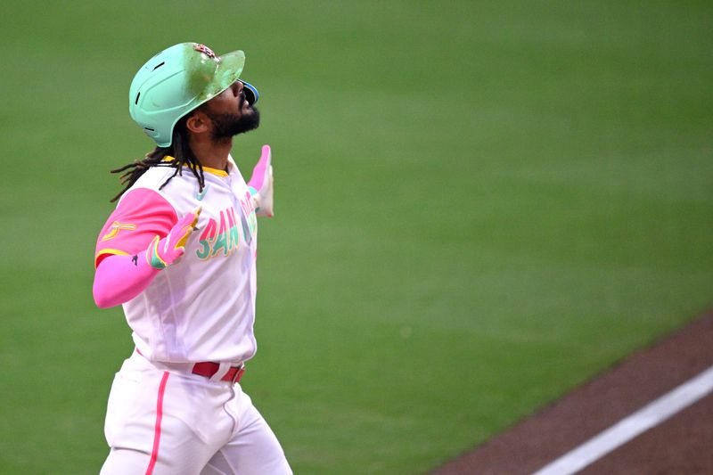 Sep 1, 2023; San Diego, California, USA; San Diego Padres right fielder Fernando Tatis (23) celebrates after hitting a two-run home run against the San Francisco Giants during the first inning at Petco Park. Mandatory Credit: Orlando Ramirez-USA TODAY Sports