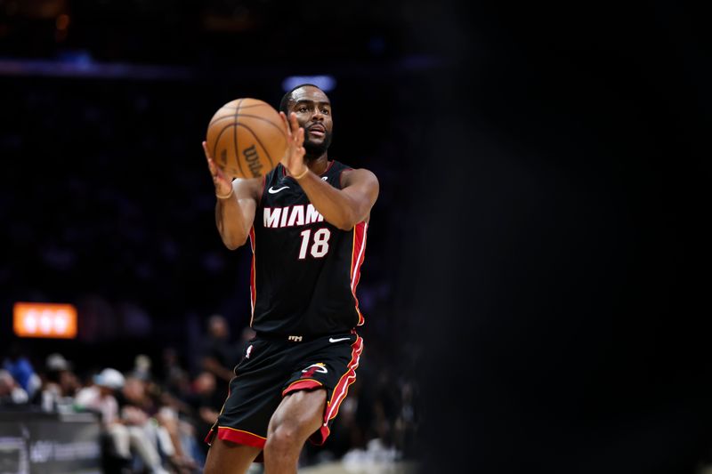 MIAMI, FLORIDA - APRIL 03: Alec Burks #18 of the Miami Heat catches a pass during the third quarter against the Memphis Grizzlies at Kaseya Center on April 03, 2025 in Miami, Florida. NOTE TO USER: User expressly acknowledges and agrees that, by downloading and or using this photograph, User is consenting to the terms and conditions of the Getty Images License Agreement. (Photo by Brennan Asplen/Getty Images)