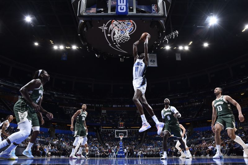 ORLANDO, FL - DECEMBER 5: Bol Bol #10 of the Orlando Magic dunks the ball during the game against the Milwaukee Bucks on December 5, 2022 at Amway Center in Orlando, Florida. NOTE TO USER: User expressly acknowledges and agrees that, by downloading and or using this photograph, User is consenting to the terms and conditions of the Getty Images License Agreement. Mandatory Copyright Notice: Copyright 2022 NBAE (Photo by Fernando Medina/NBAE via Getty Images)