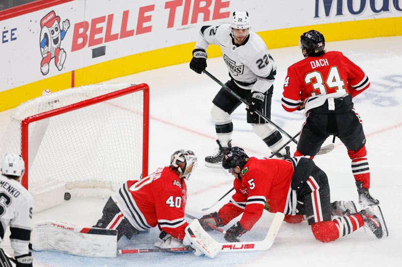 Oct 26, 2025; Chicago, Illinois, USA; Los Angeles Kings left wing Kevin Fiala (22) scores against Chicago Blackhawks goaltender Arvid Soderblom (40) during the second period at United Center. Mandatory Credit: Kamil Krzaczynski-Imagn Images