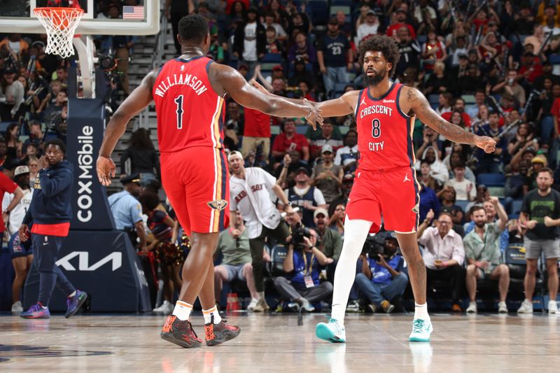 NEW ORLEANS, LA - MARCH 16: Zion Williamson #1 and Naji Marshall #8 of the New Orleans Pelicans high five during the game against the Portland Trail Blazers on March 16, 2024 at the Smoothie King Center in New Orleans, Louisiana. NOTE TO USER: User expressly acknowledges and agrees that, by downloading and or using this Photograph, user is consenting to the terms and conditions of the Getty Images License Agreement. Mandatory Copyright Notice: Copyright 2024 NBAE (Photo by Layne Murdoch Jr./NBAE via Getty Images)