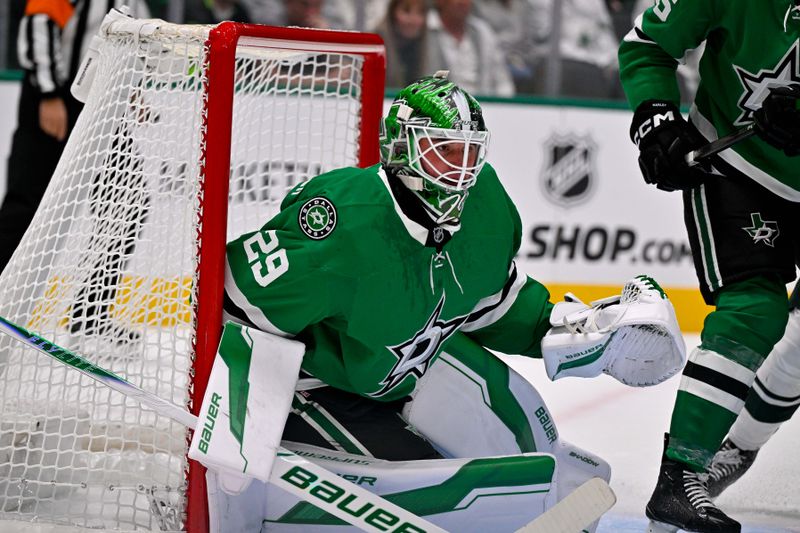 Oct 14, 2025; Dallas, Texas, USA; Dallas Stars goaltender Jake Oettinger (29) faces the Minnesota Wild attack during the first period at the American Airlines Center. Mandatory Credit: Jerome Miron-Imagn Images