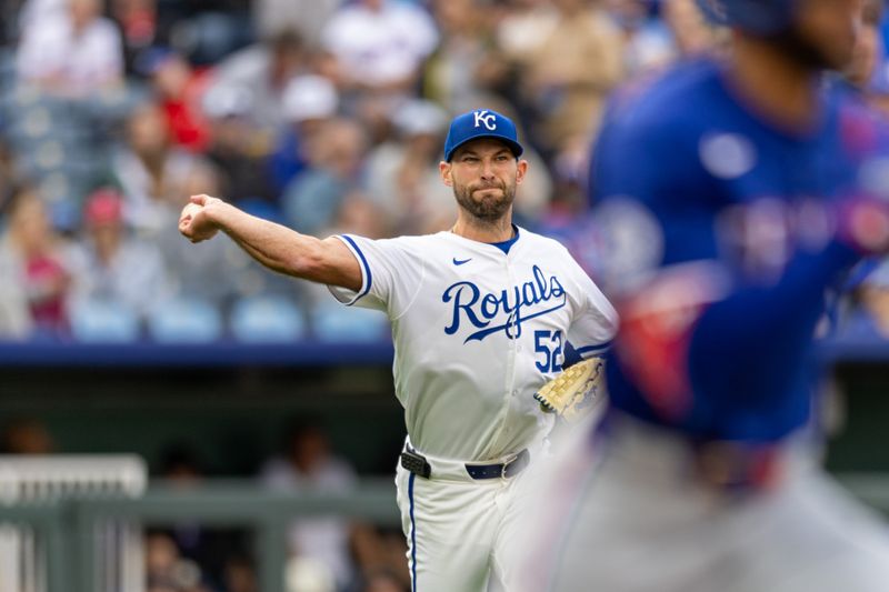 May 4, 2024; Kansas City, Missouri, USA; Kansas City Royals pitcher Michael Wacha (52) throws to first base during the second inning against the Texas Rangers at Kauffman Stadium. Mandatory Credit: William Purnell-USA TODAY Sports