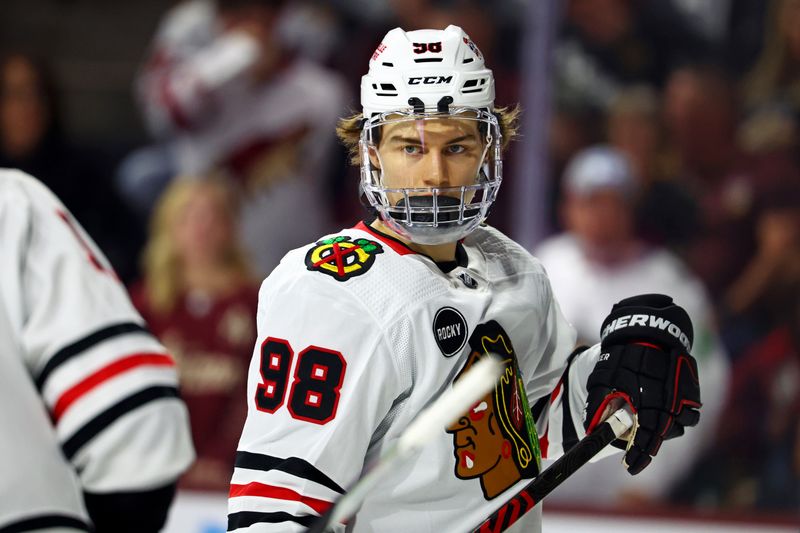 Mar 5, 2024; Tempe, Arizona, USA;  Chicago Blackhawks center Connor Bedard (98) looks on during the second period of the game against the Arizona Coyotes at Mullett Arena. Mandatory Credit: Mark J. Rebilas-USA TODAY Sports