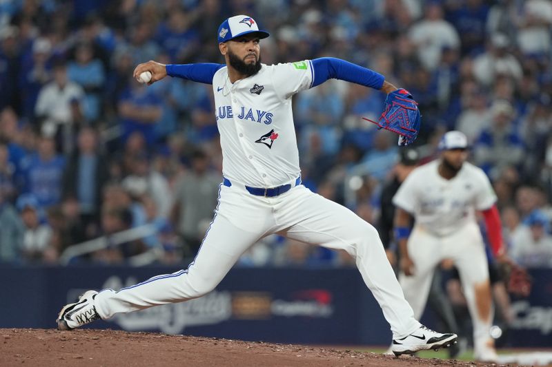 Oct 24, 2025; Toronto, Ontario, CAN; Toronto Blue Jays pitcher Seranthony Dominguez (48) pitches against the Los Angeles Dodgers in the fifth inning during game one of the 2025 MLB World Series at Rogers Centre. Mandatory Credit: Nick Turchiaro-Imagn Images