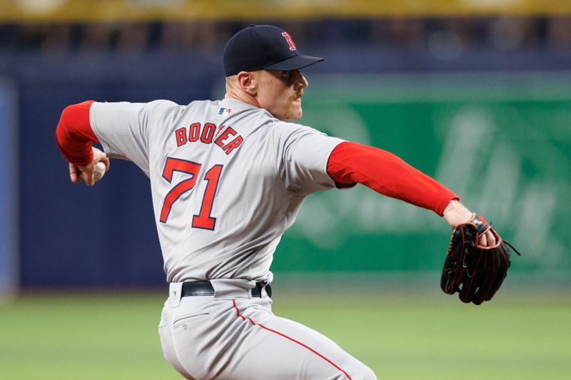 May 22, 2024; St. Petersburg, Florida, USA;  Boston Red Sox pitcher Cam Booser (71) throws a pitch against the Tampa Bay Rays in the seventh inning at Tropicana Field. Mandatory Credit: Nathan Ray Seebeck-USA TODAY Sports