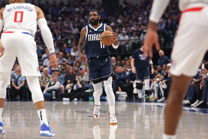 DALLAS, TX - APRIL 28: Kyrie Irving #11 of the Dallas Mavericks dribbles the ball during the game against the LA Clippers during Round 1 Game 4 of the 2024 NBA Playoffs on April 28, 2024 at the American Airlines Center in Dallas, Texas. NOTE TO USER: User expressly acknowledges and agrees that, by downloading and or using this photograph, User is consenting to the terms and conditions of the Getty Images License Agreement. Mandatory Copyright Notice: Copyright 2024 NBAE (Photo by Tim Heitman/NBAE via Getty Images)