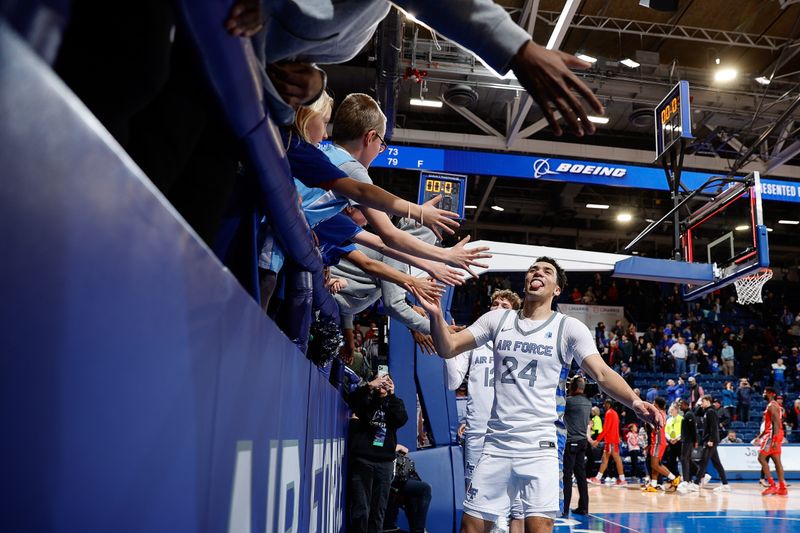 Feb 10, 2023; Colorado Springs, Colorado, USA; Air Force Falcons guard Jeffrey Mills (24) reacts with fans after the game against the New Mexico Lobos at Clune Arena. Mandatory Credit: Isaiah J. Downing-USA TODAY Sports