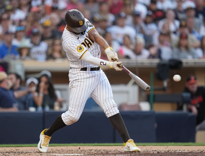 Aug 16, 2023; San Diego, California, USA; San Diego Padres shortstop Xander Bogaerts (2) hits an RBI single scoring second baseman Ha-Seong Kim (7) during the third inning against the Baltimore Orioles at Petco Park. Mandatory Credit: Ray Acevedo-USA TODAY Sports