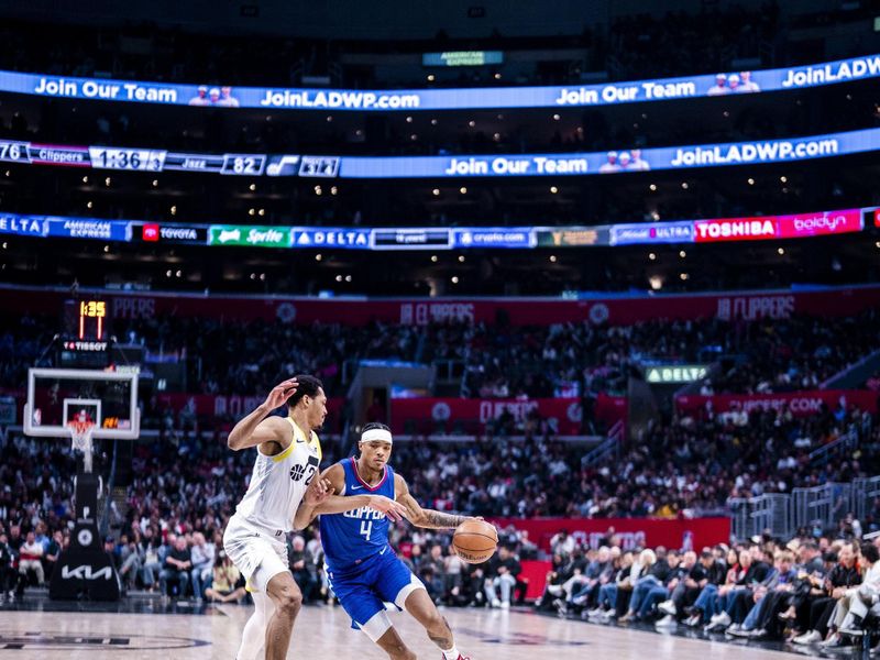 LOS ANGELES, CA - APRIL 12: Brandon Boston Jr. #4 of the LA Clippers drives to the basket during the game against the Utah Jazz on April 12, 2024 at Crypto.Com Arena in Los Angeles, California. NOTE TO USER: User expressly acknowledges and agrees that, by downloading and/or using this Photograph, user is consenting to the terms and conditions of the Getty Images License Agreement. Mandatory Copyright Notice: Copyright 2024 NBAE (Photo by Tyler Ross/NBAE via Getty Images)