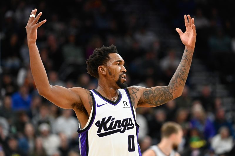 SALT LAKE CITY, UTAH - OCTOBER 29: Malik Monk #0 of the Sacramento Kings reacts to a play during the second half of a game against the Utah Jazz at Delta Center on October 29, 2024 in Salt Lake City, Utah. NOTE TO USER: User expressly acknowledges and agrees that, by downloading and or using this photograph, User is consenting to the terms and conditions of the Getty Images License Agreement.  (Photo by Alex Goodlett/Getty Images)