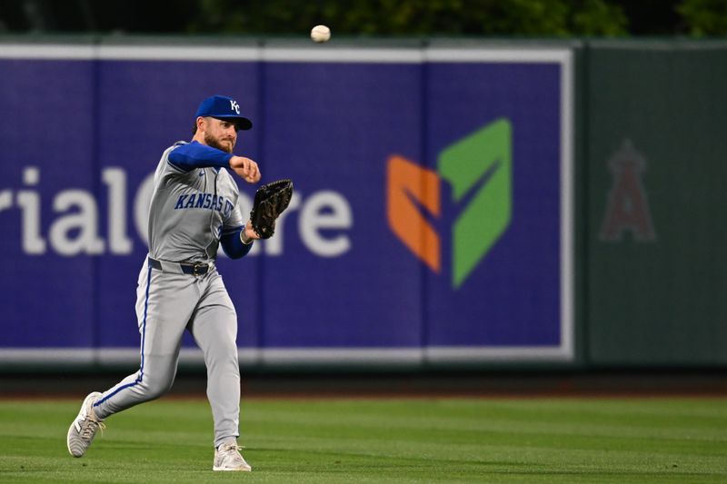 May 11, 2024; Anaheim, California, USA; Kansas City Royals outfielder Kyle Isbel (28) fields a ball against the Los Angeles Angels during the seventh inning at Angel Stadium. Mandatory Credit: Jonathan Hui-USA TODAY Sports