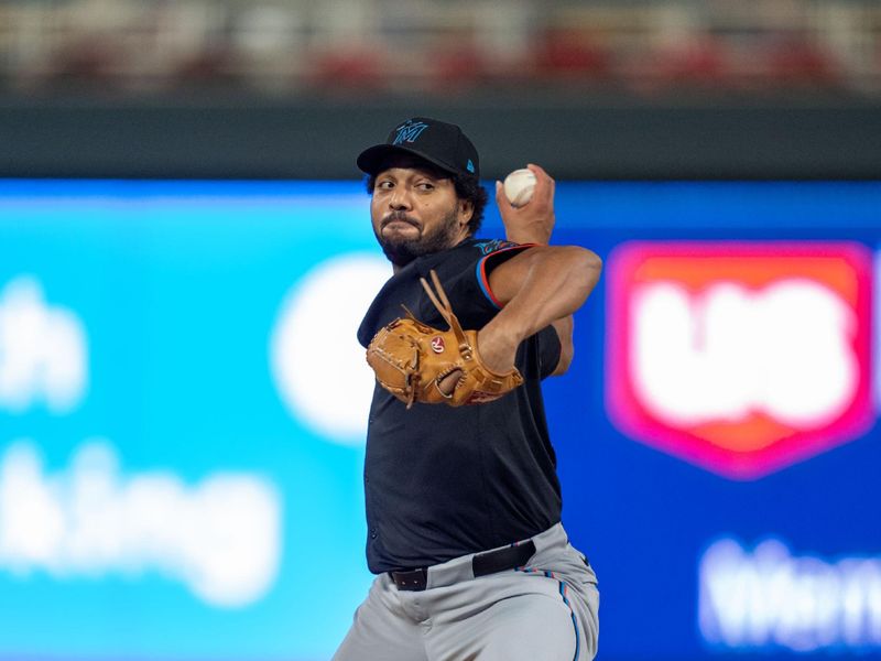 Sep 26, 2024; Minneapolis, Minnesota, USA; Miami Marlins pitcher Michael Petersen (70) pitches in the tenth inning agains the Minnesota Twins at Target Field. Mandatory Credit: Matt Blewett-Imagn Images
