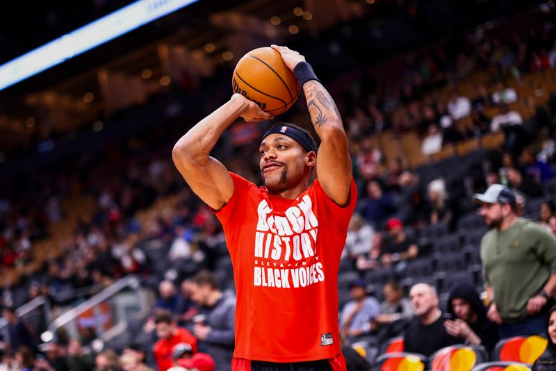 TORONTO, CANADA - FEBRUARY 10: Bruce Brown #11 of the Toronto Raptors warms up before the game against the Cleveland Cavaliers on February 10, 2024 at the Scotiabank Arena in Toronto, Ontario, Canada.  NOTE TO USER: User expressly acknowledges and agrees that, by downloading and or using this Photograph, user is consenting to the terms and conditions of the Getty Images License Agreement.  Mandatory Copyright Notice: Copyright 2024 NBAE (Photo by Vaughn Ridley/NBAE via Getty Images)