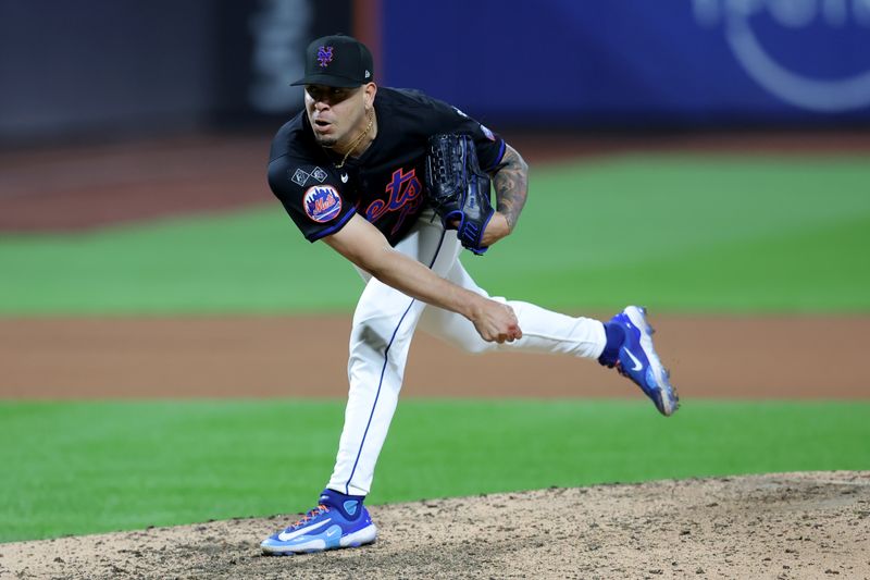 Sep 6, 2024; New York City, New York, USA; New York Mets relief pitcher Jose Butto (70) follows through on a pitch against the Cincinnati Reds during the tenth inning at Citi Field. Mandatory Credit: Brad Penner-Imagn Images