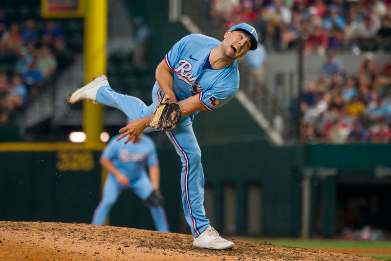 Sep 24, 2023; Arlington, Texas, USA; Texas Rangers relief pitcher Brock Burke (46) pitches against the Seattle Mariners during the game at Globe Life Field. Mandatory Credit: Jerome Miron-USA TODAY Sports