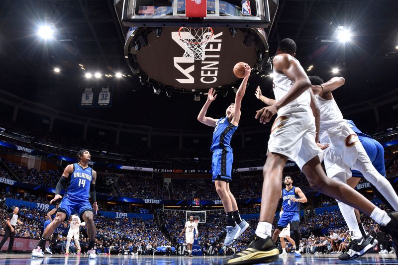 ORLANDO, FL - APRIL 27: Franz Wagner #22 of the Orlando Magic drives to the basket during the game against the Cleveland Cavaliers during Round 1 Game 4 of the 2024 NBA Playoffs on April 27, 2024 at the Kia Center in Orlando, Florida. NOTE TO USER: User expressly acknowledges and agrees that, by downloading and or using this photograph, User is consenting to the terms and conditions of the Getty Images License Agreement. Mandatory Copyright Notice: Copyright 2024 NBAE (Photo by Fernando Medina/NBAE via Getty Images)