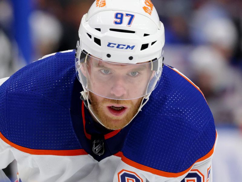 Mar 9, 2024; Buffalo, New York, USA;  Edmonton Oilers center Connor McDavid (97) waits for the face-off during the first period against the Buffalo Sabres at KeyBank Center. Mandatory Credit: Timothy T. Ludwig-USA TODAY Sports