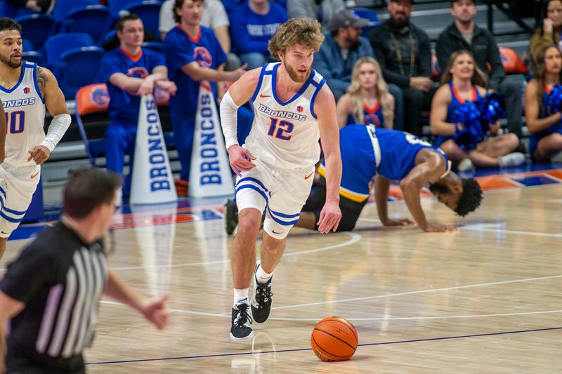 Jan 3, 2023; Boise, Idaho, USA; Boise State Broncos guard Max Rice (12) starts a fast break during the second half against the San Jose State Spartans at ExtraMile Arena. Mandatory Credit: Brian Losness-USA TODAY Sports

