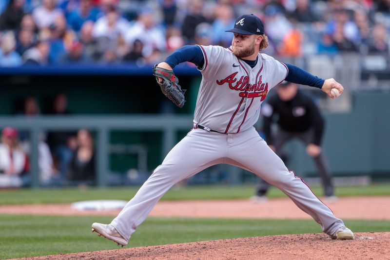 Apr 16, 2023; Kansas City, Missouri, USA; Atlanta Braves relief pitcher A.J. Minter (33) pitching during the ninth inning against the Kansas City Royals at Kauffman Stadium. Mandatory Credit: William Purnell-USA TODAY Sports