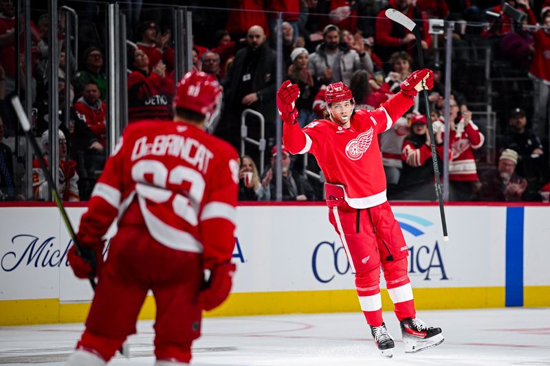 Mar 16, 2026; Detroit, Michigan, USA; Detroit Red Wings defenseman Moritz Seider (53) celebrates his goal during the second period against the Calgary Flames at Little Caesars Arena. Mandatory Credit: Tim Fuller-Imagn Images