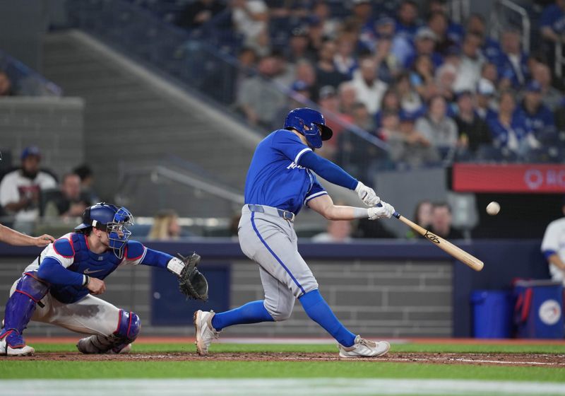 May 1, 2024; Toronto, Ontario, CAN; Kansas City Royals second baseman Michael Massey (19) hits a three run home run against the Toronto Blue Jays during the eighth inning at Rogers Centre. Mandatory Credit: Nick Turchiaro-USA TODAY Sports