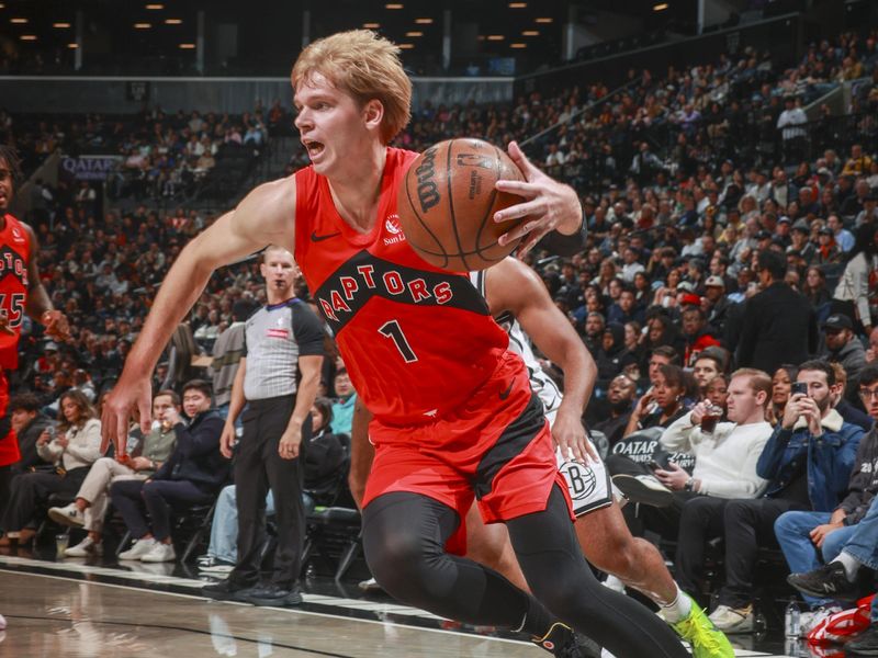 BROOKLYN, NY - OCTOBER 18: Gradey Dick #1 of the Toronto Raptors drives to the basket during the game on October 18, 2024 at Barclays Center in Brooklyn, New York. NOTE TO USER: User expressly acknowledges and agrees that, by downloading and or using this Photograph, user is consenting to the terms and conditions of the Getty Images License Agreement. Mandatory Copyright Notice: Copyright 2024 NBAE (Photo by Nathaniel S. Butler/NBAE via Getty Images)