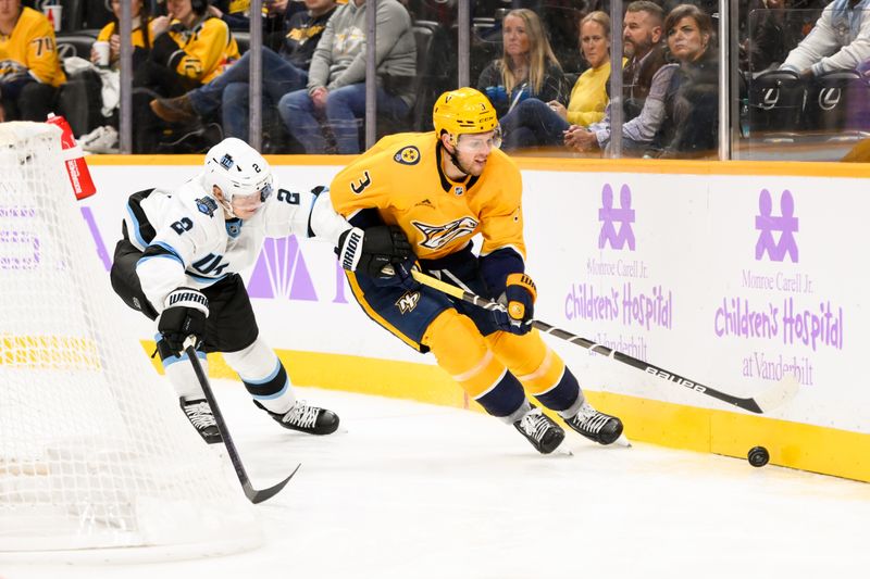 Nov 9, 2024; Nashville, Tennessee, USA;  Nashville Predators defenseman Jeremy Lauzon (3) skates behind the net against the Utah Hockey Club during the third period at Bridgestone Arena. Mandatory Credit: Steve Roberts-Imagn Images