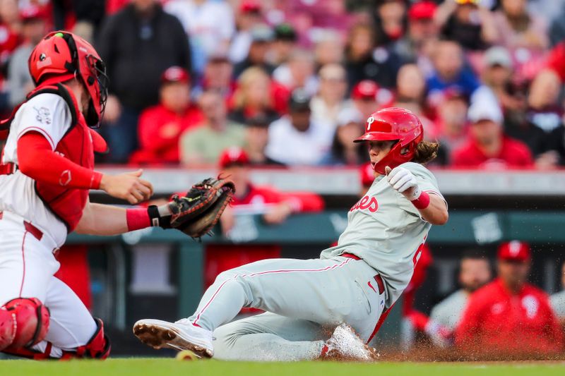 Apr 22, 2024; Cincinnati, Ohio, USA; Philadelphia Phillies third baseman Alec Bohm (28) scores on a sacrifice fly hit by second baseman Bryson Stott (not pictured) in the second inning against the Cincinnati Reds at Great American Ball Park. Mandatory Credit: Katie Stratman-USA TODAY Sports